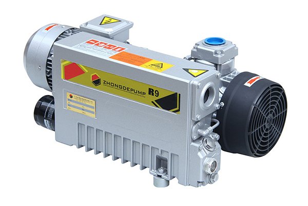 Light gray pump with ribbed housing, electric motor and circular fan cover.